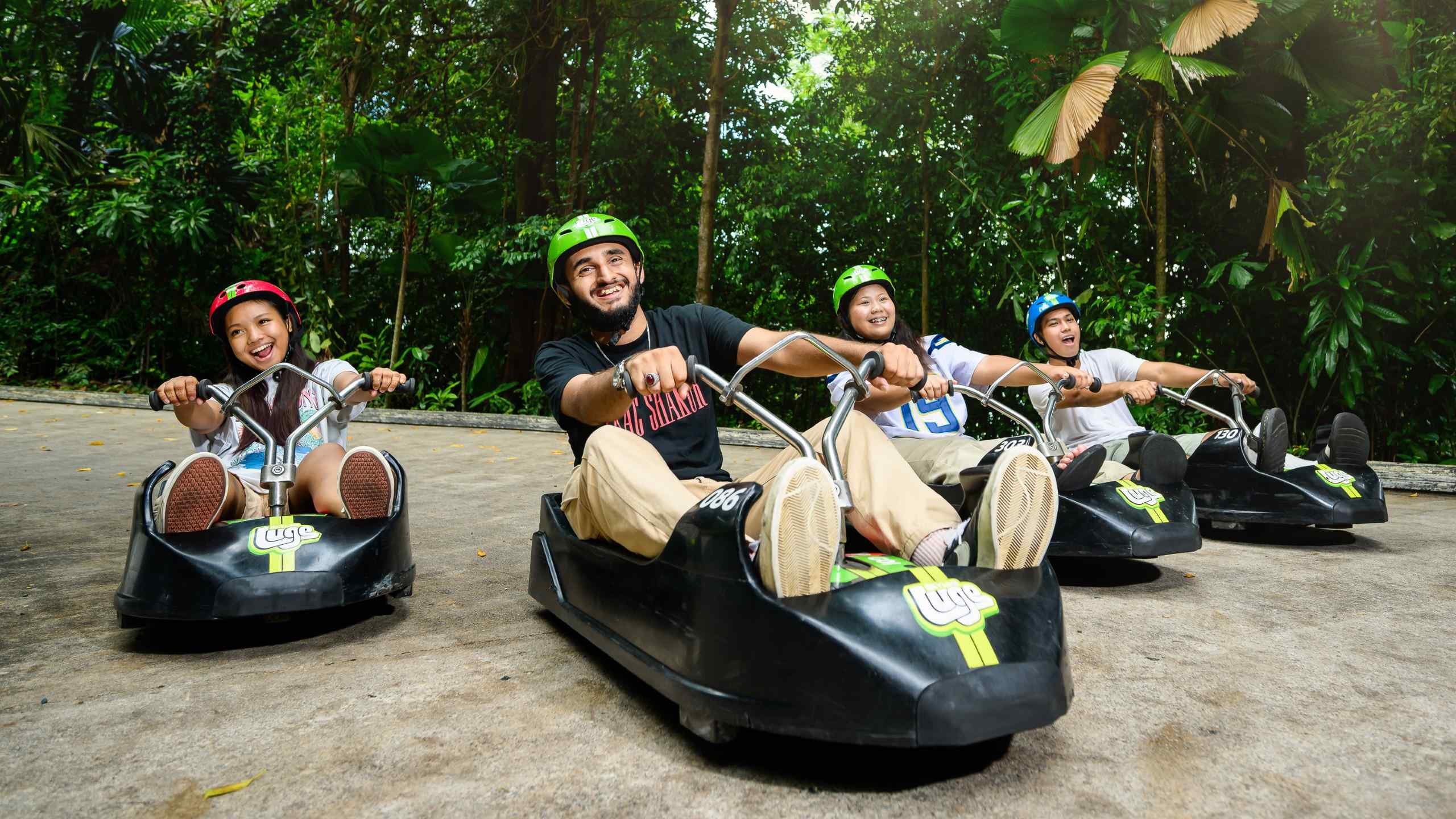 A group of friends enjoy Luge together