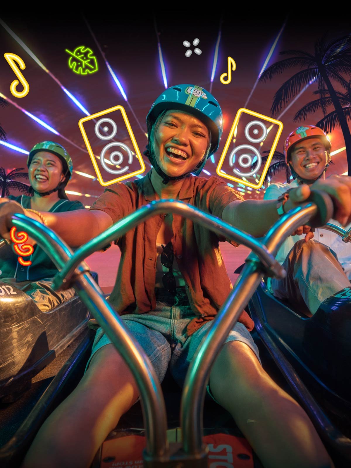 Skyline Luge Singapore A group of youths on the luge carts enjoying party music with reggae vibes