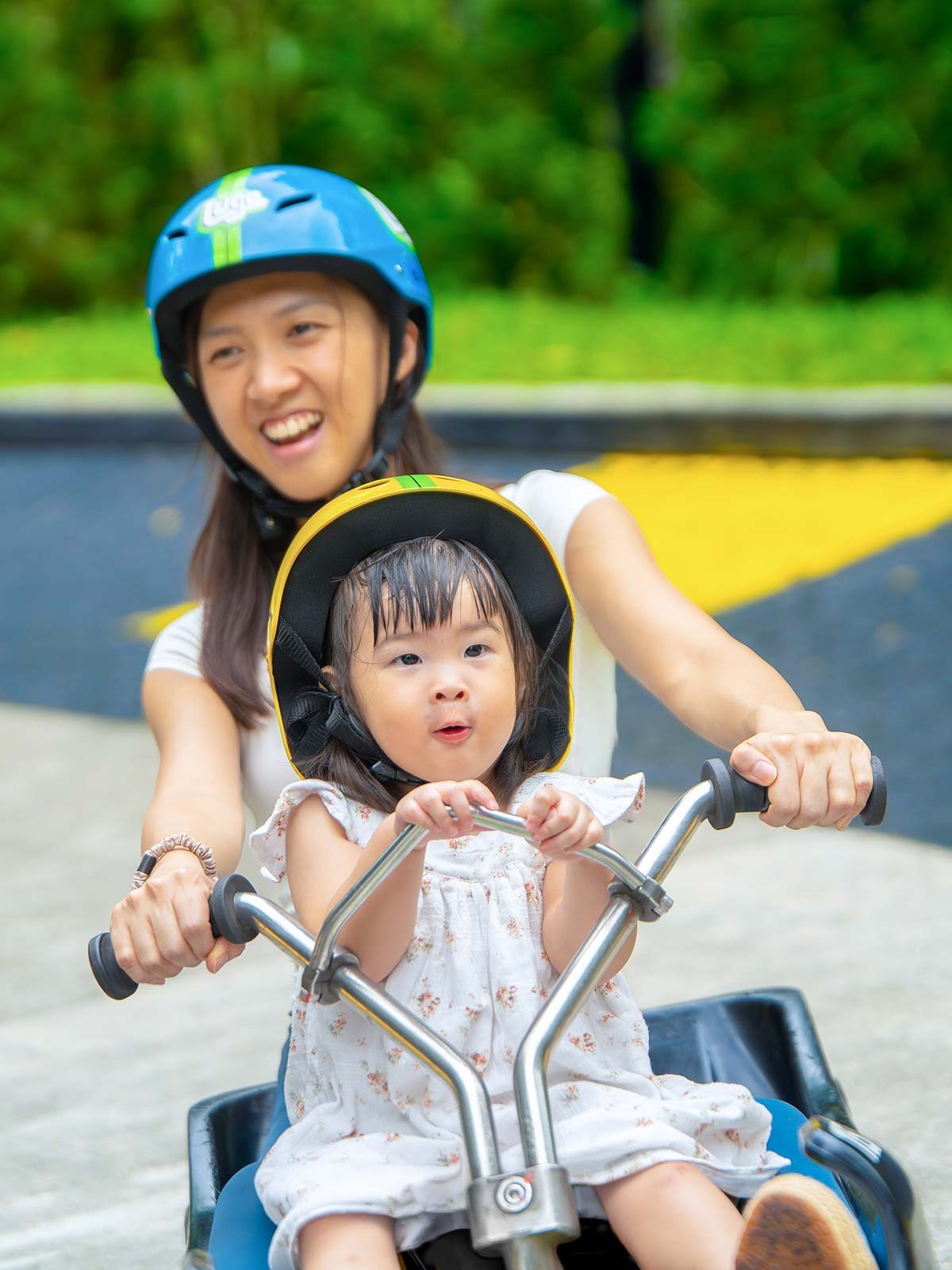 Skyline Luge Singapore a Mother and Child Riding Tandem