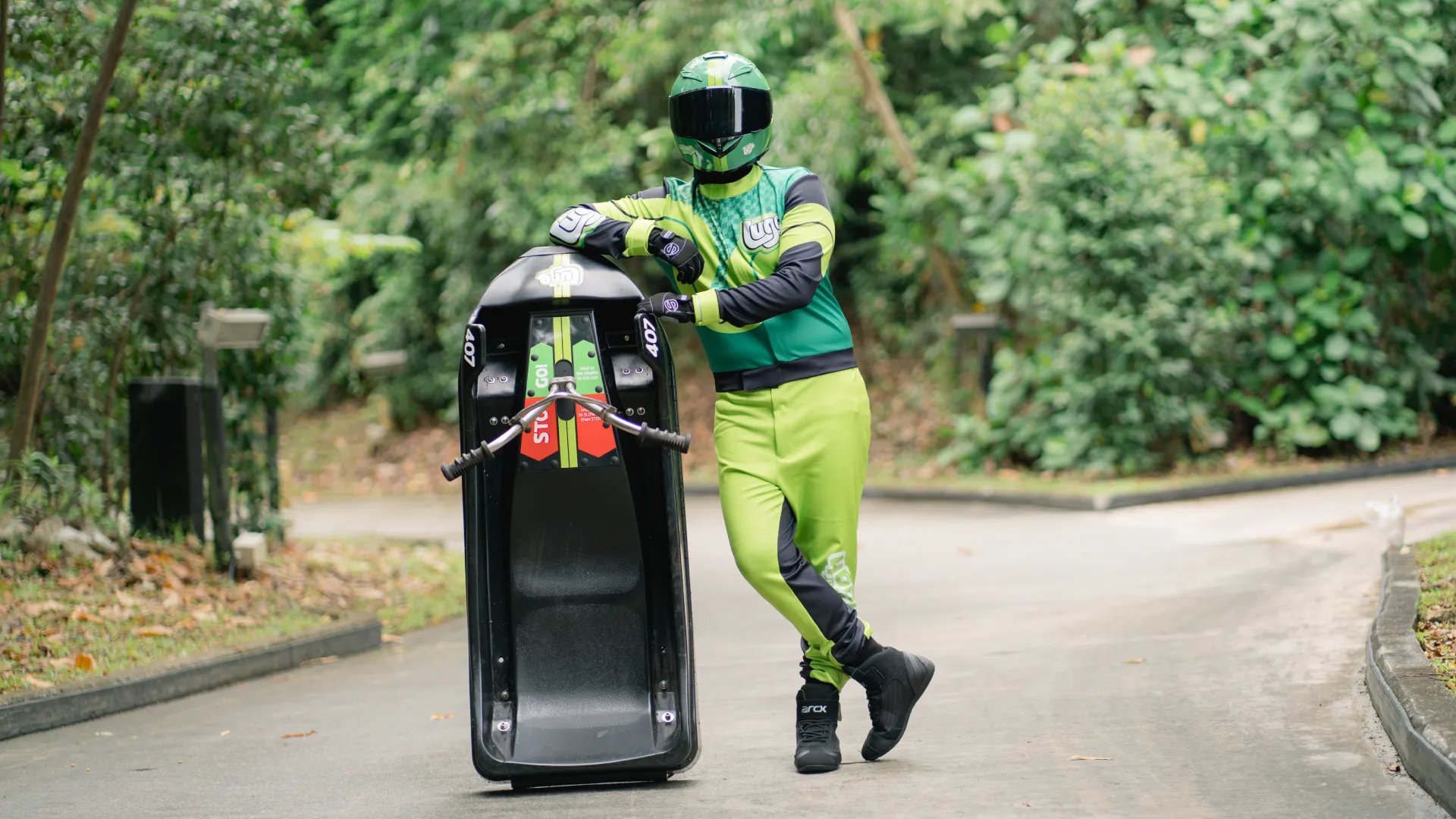 Skyline Luge Singapore Luge Champ Posing with Luge Cart