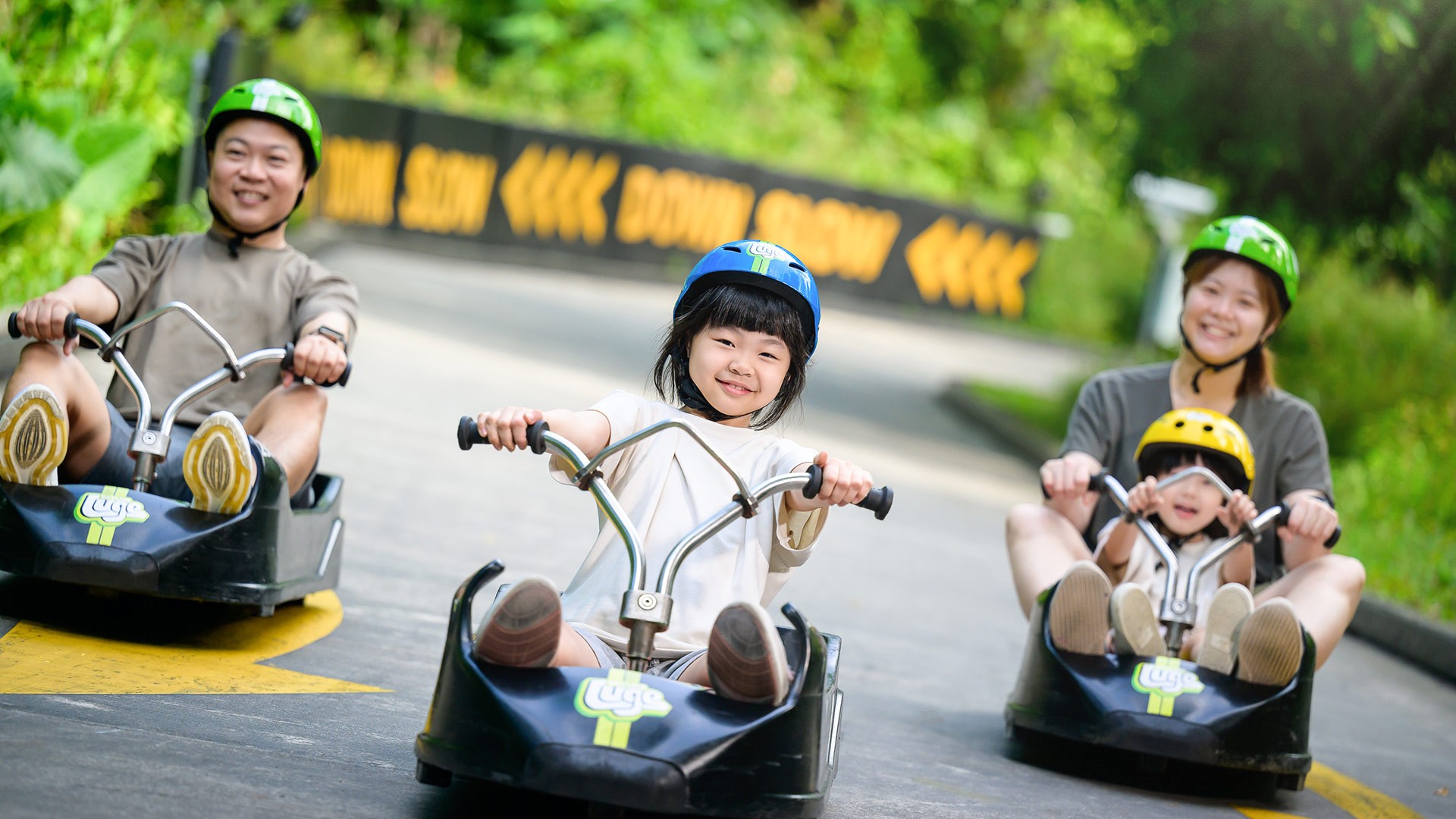 Skyline Luge Singapore Little Luge Champs Campaign - a family on Luge Carts