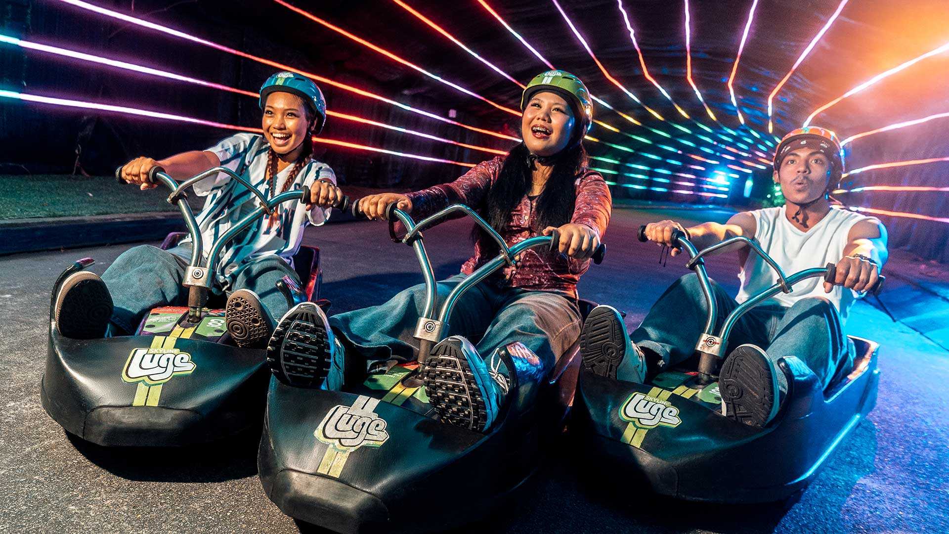 Skyline Luge Singapore A group of youths riding Luge Carts together